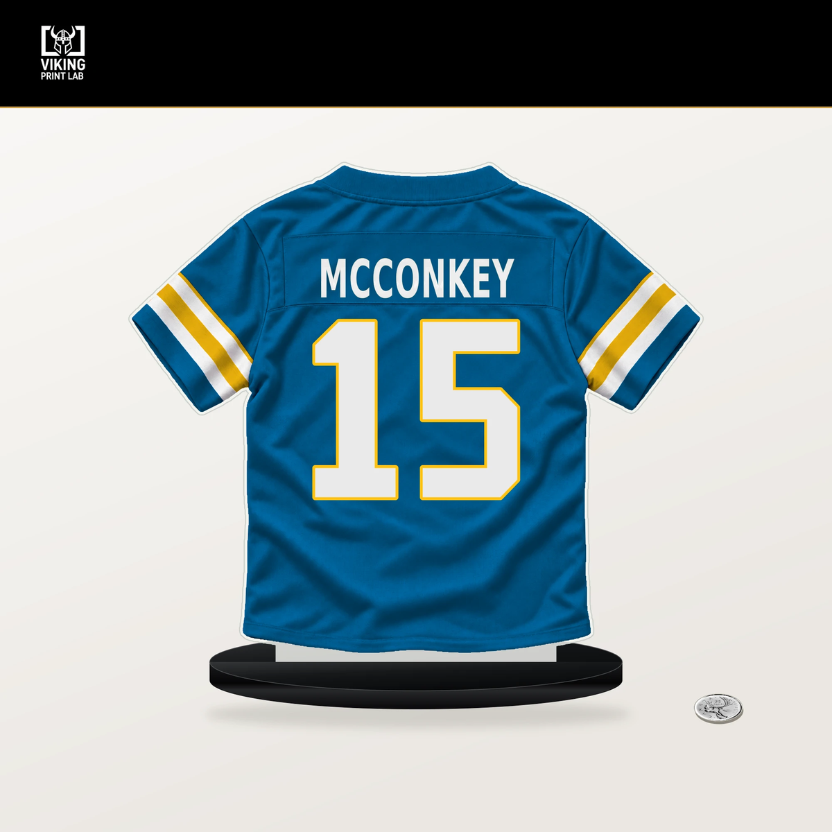 Ladd McConkey number 15 Los Angeles Chargers jersey stand with included black base.