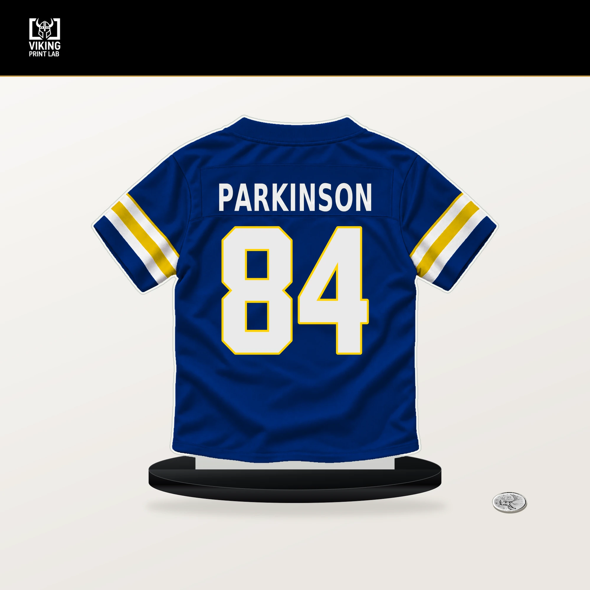 Colby Parkinson number 84 Los Angeles Rams jersey stand with included black base.
