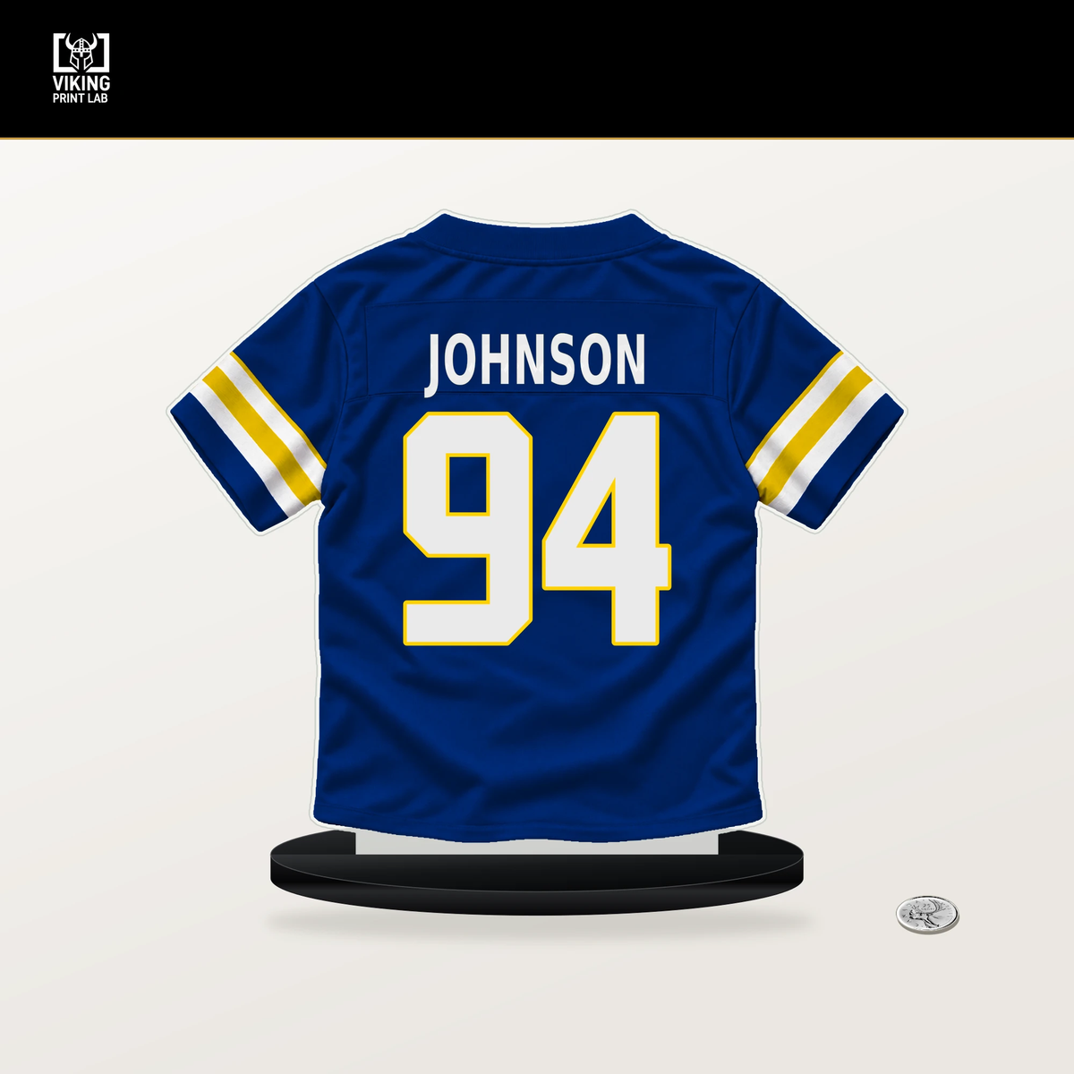 Desjuan Johnson number 94 Los Angeles Rams jersey stand with included black base.