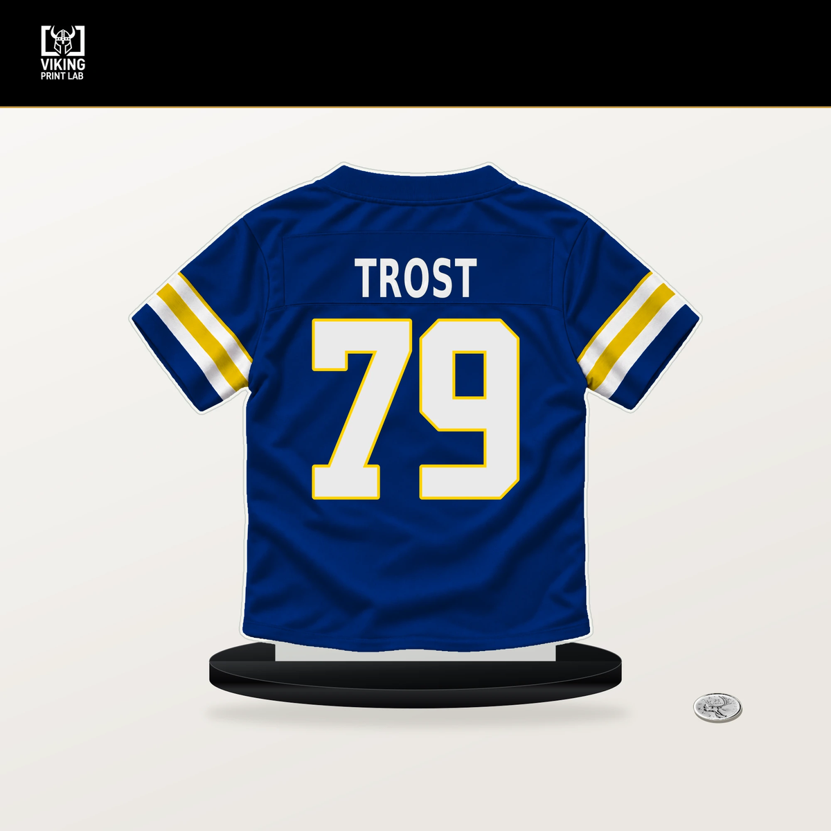 Keagen Trost number 79 Los Angeles Rams jersey stand with included black base.