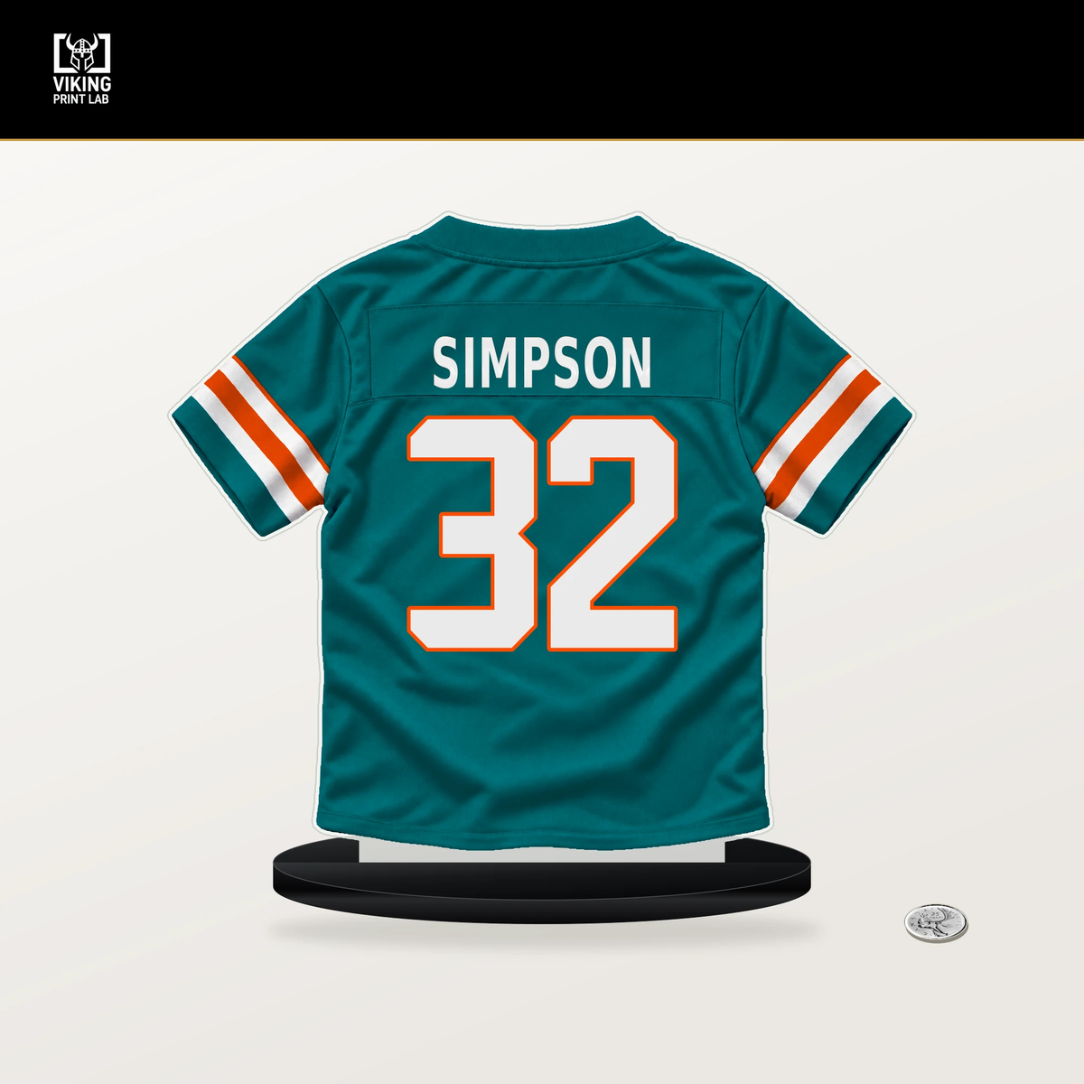 Jaylin Simpson number 32 Miami Dolphins jersey stand with included black base.