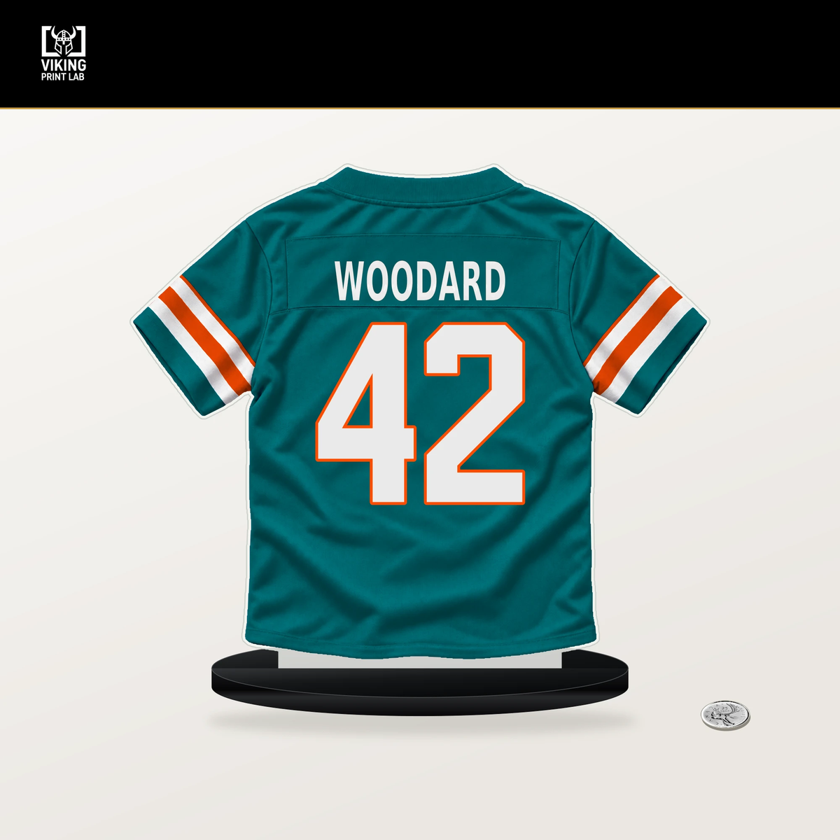 Jackson Woodard number 42 Miami Dolphins jersey stand with included black base.