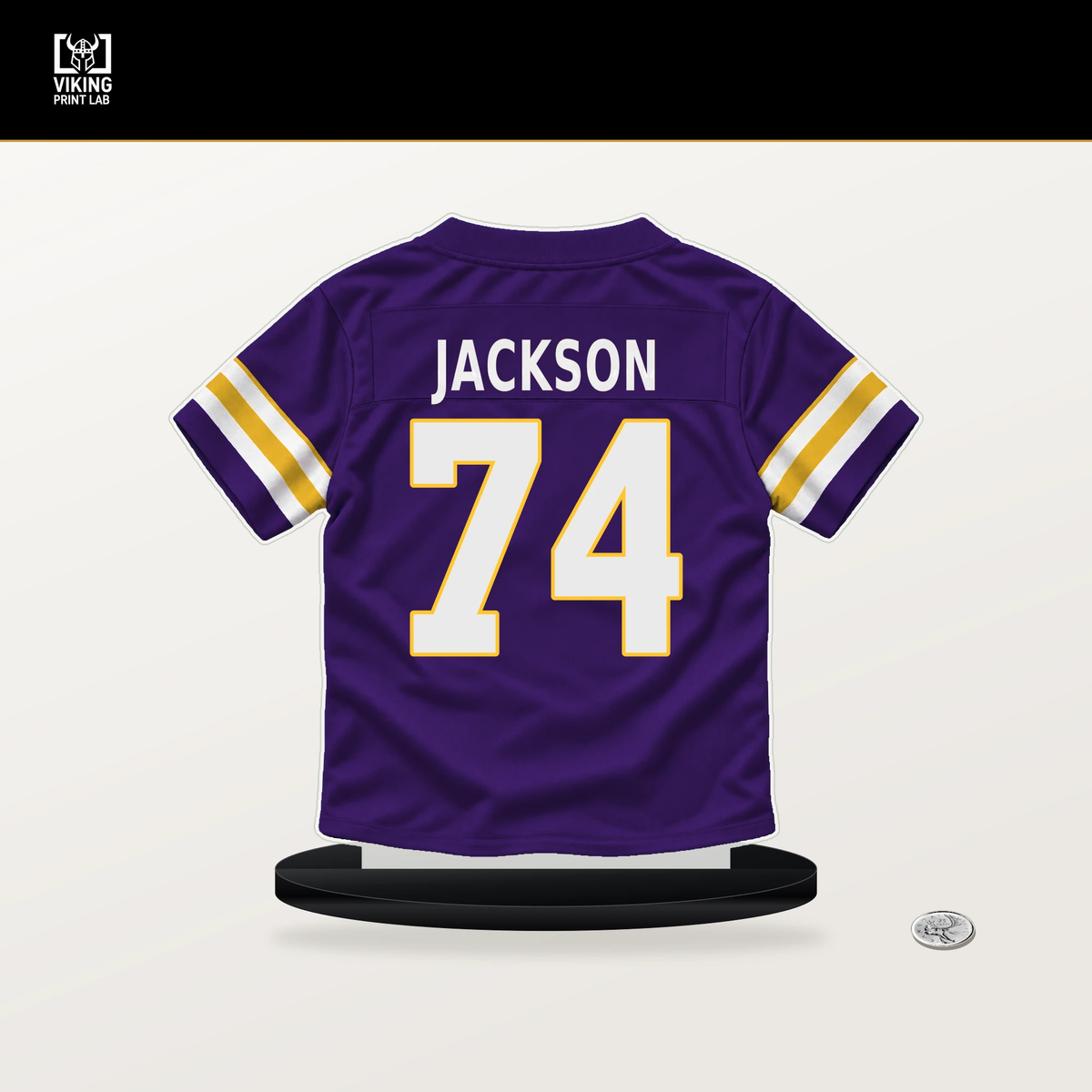 Donovan Jackson number 74 Minnesota Vikings jersey stand with included black base.