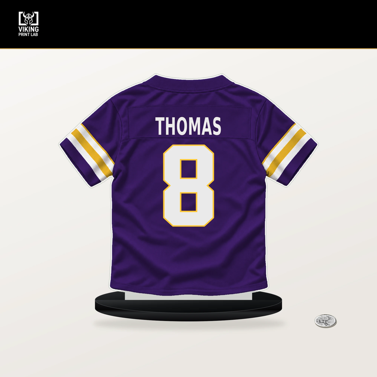 Jakobe Thomas number 8 Minnesota Vikings jersey stand with included black base.