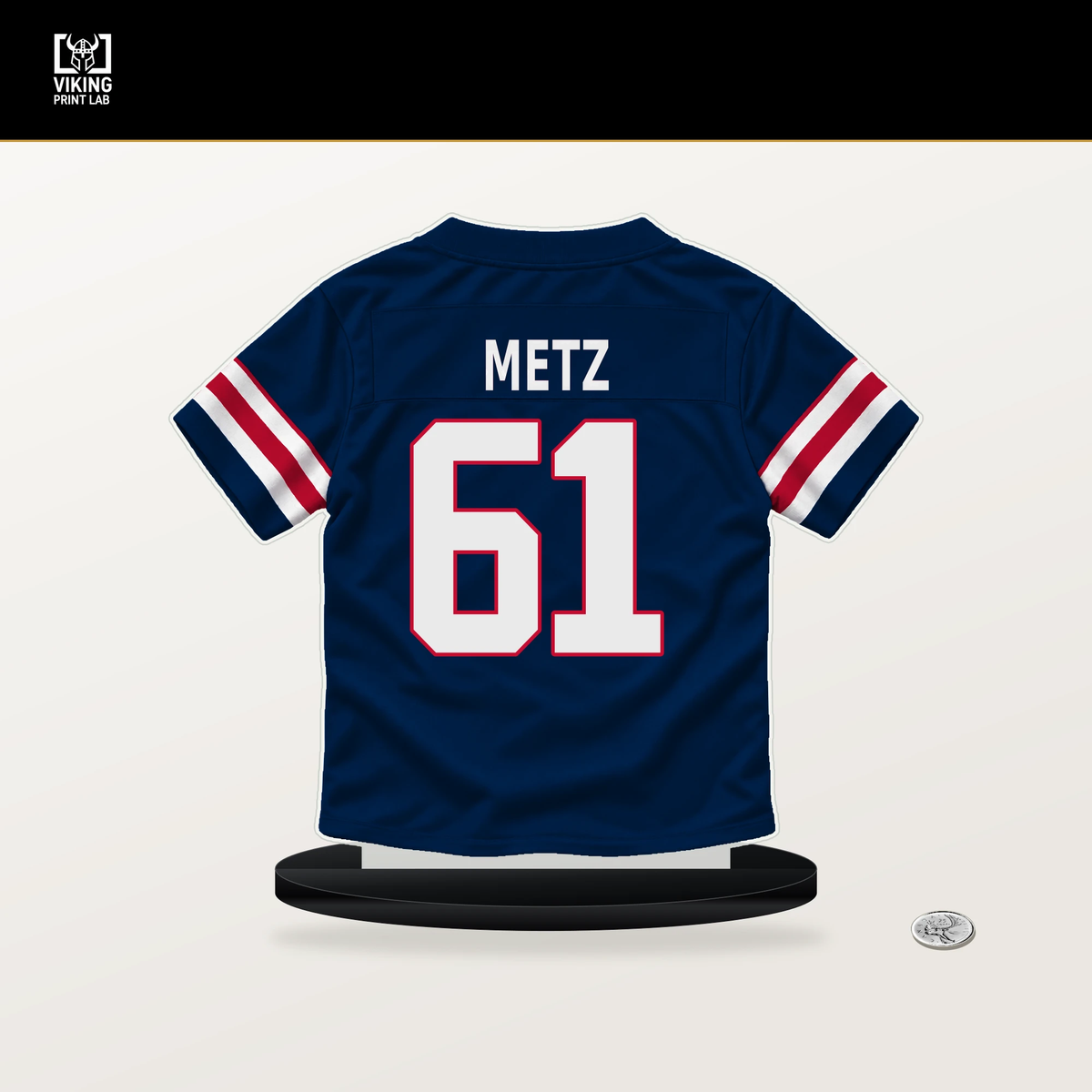 Lorenz Metz number 61 New England Patriots jersey stand with included black base.