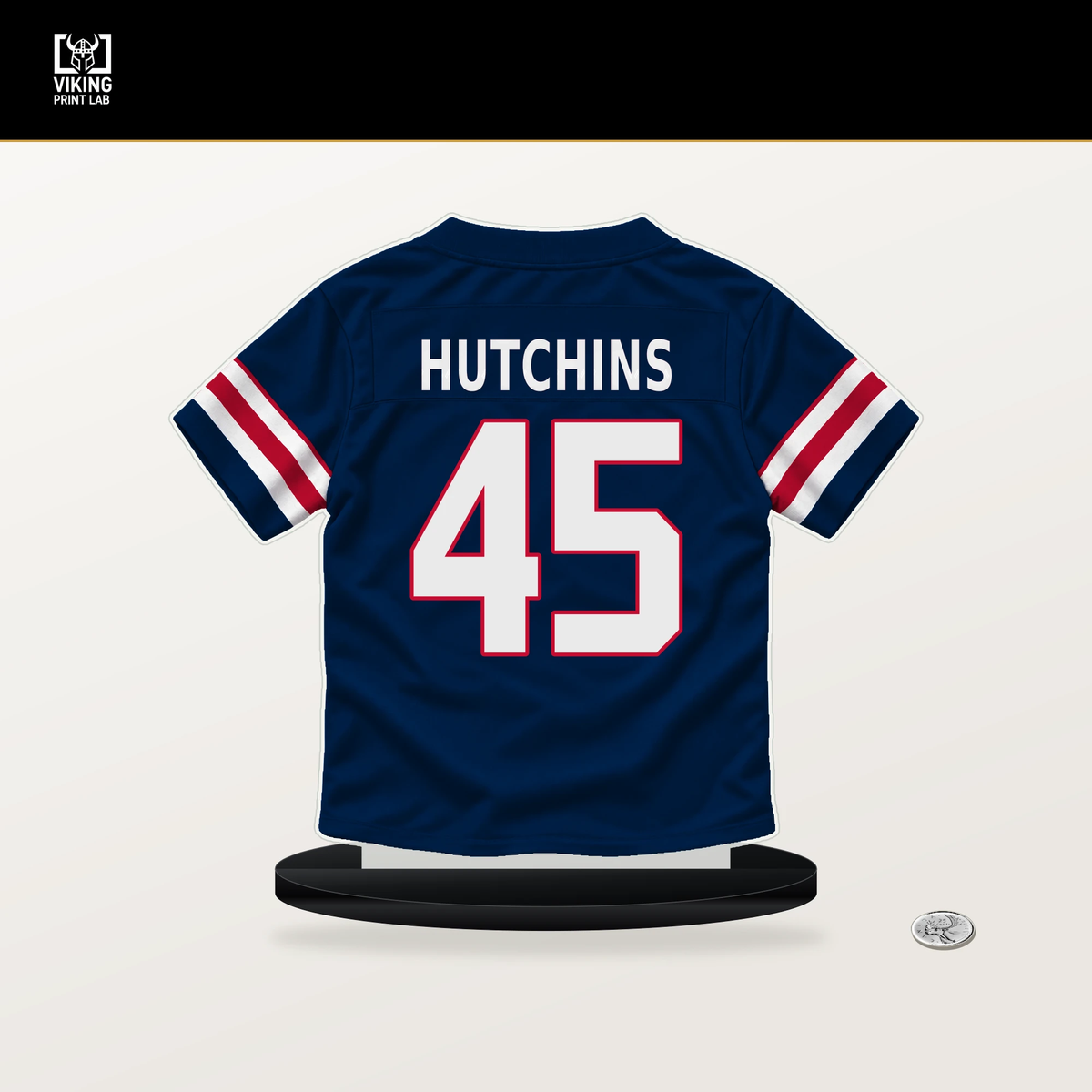 Quintayvious Hutchins number 45 New England Patriots jersey stand with included black base.