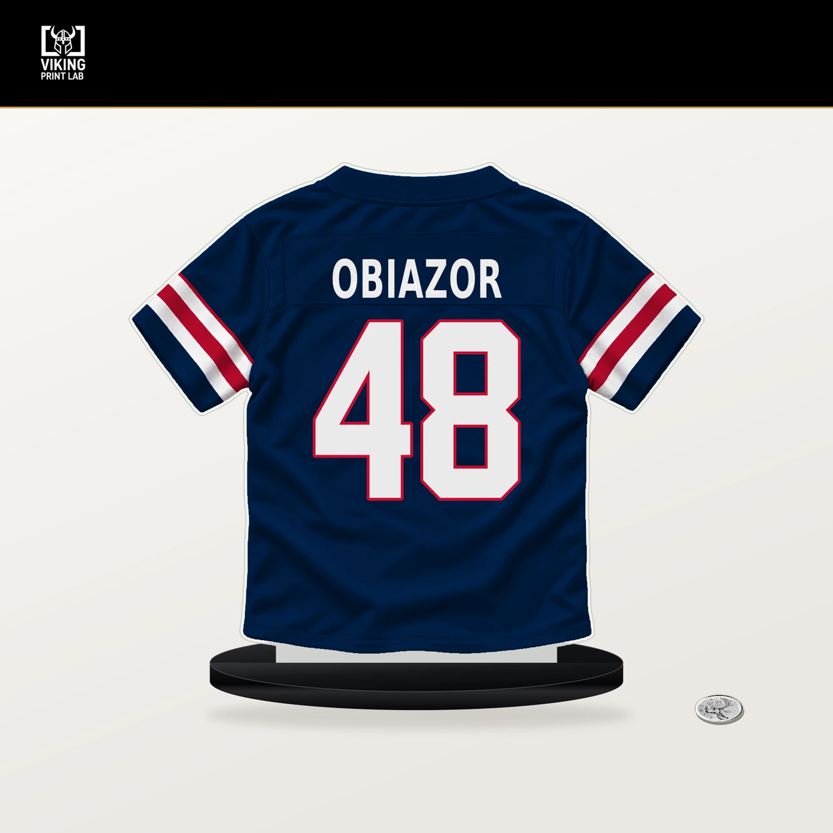 Namdi Obiazor number 48 New England Patriots jersey stand with included black base.