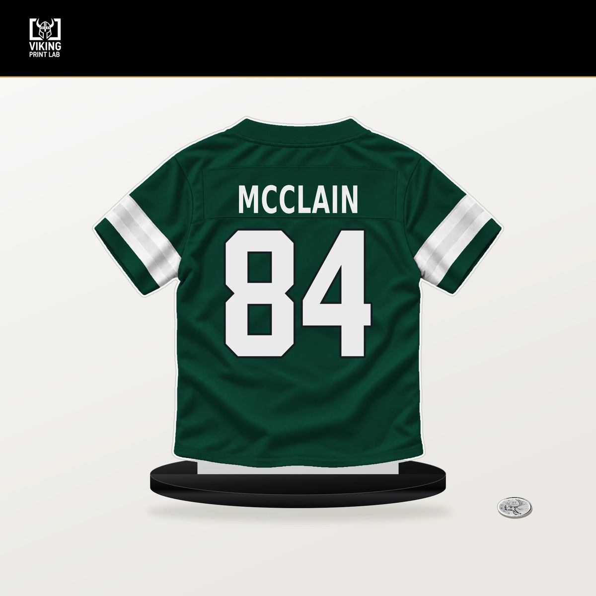 Malik McClain number 84 New York Jets jersey stand with included black base.