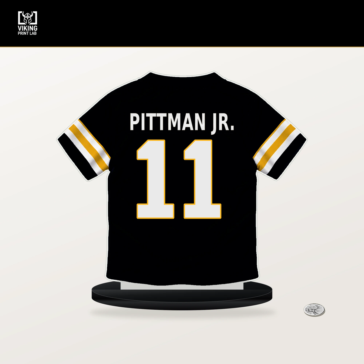 Michael Pittman Jr. number 11 Pittsburgh Steelers jersey stand with included black base.