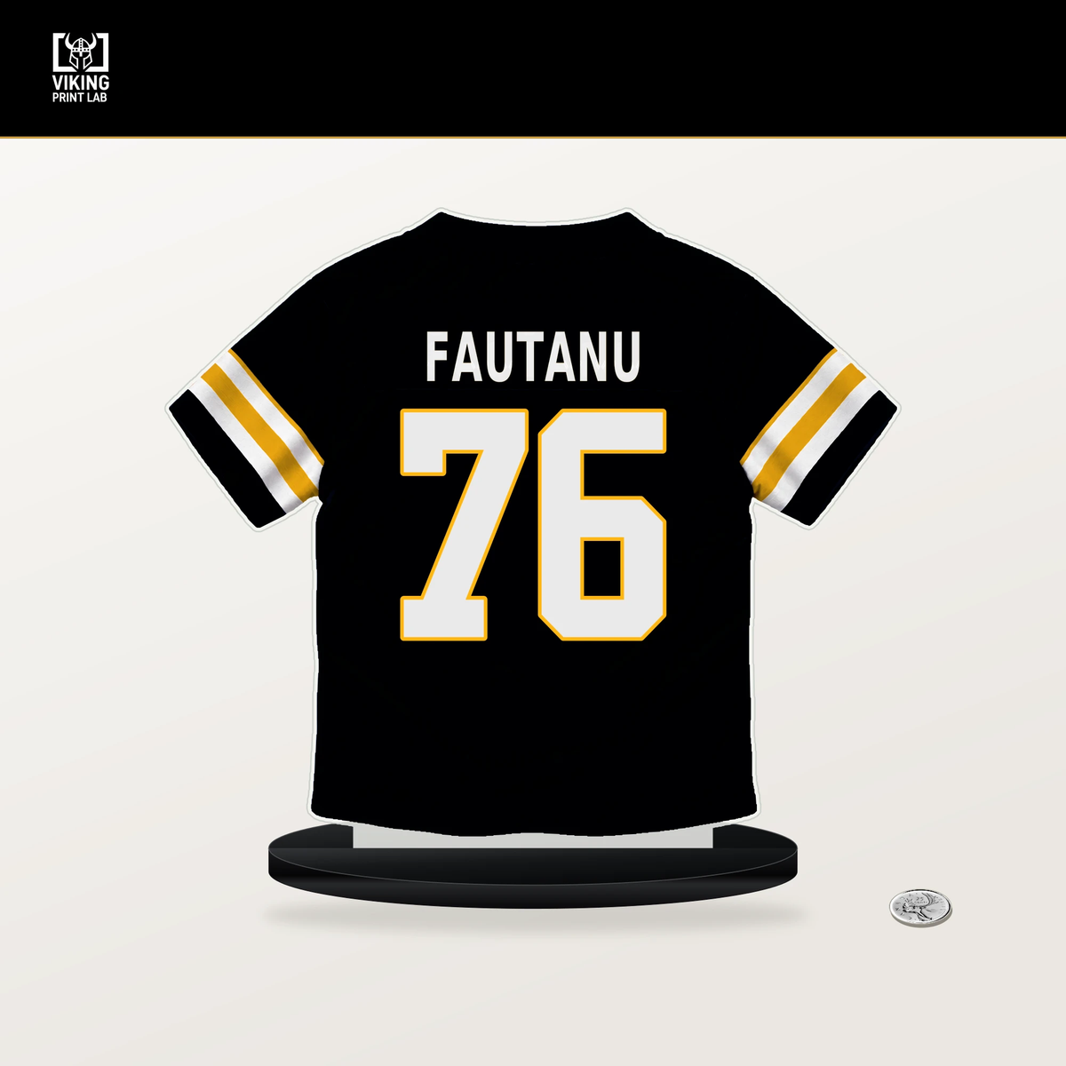 Troy Fautanu number 76 Pittsburgh Steelers jersey stand with included black base.