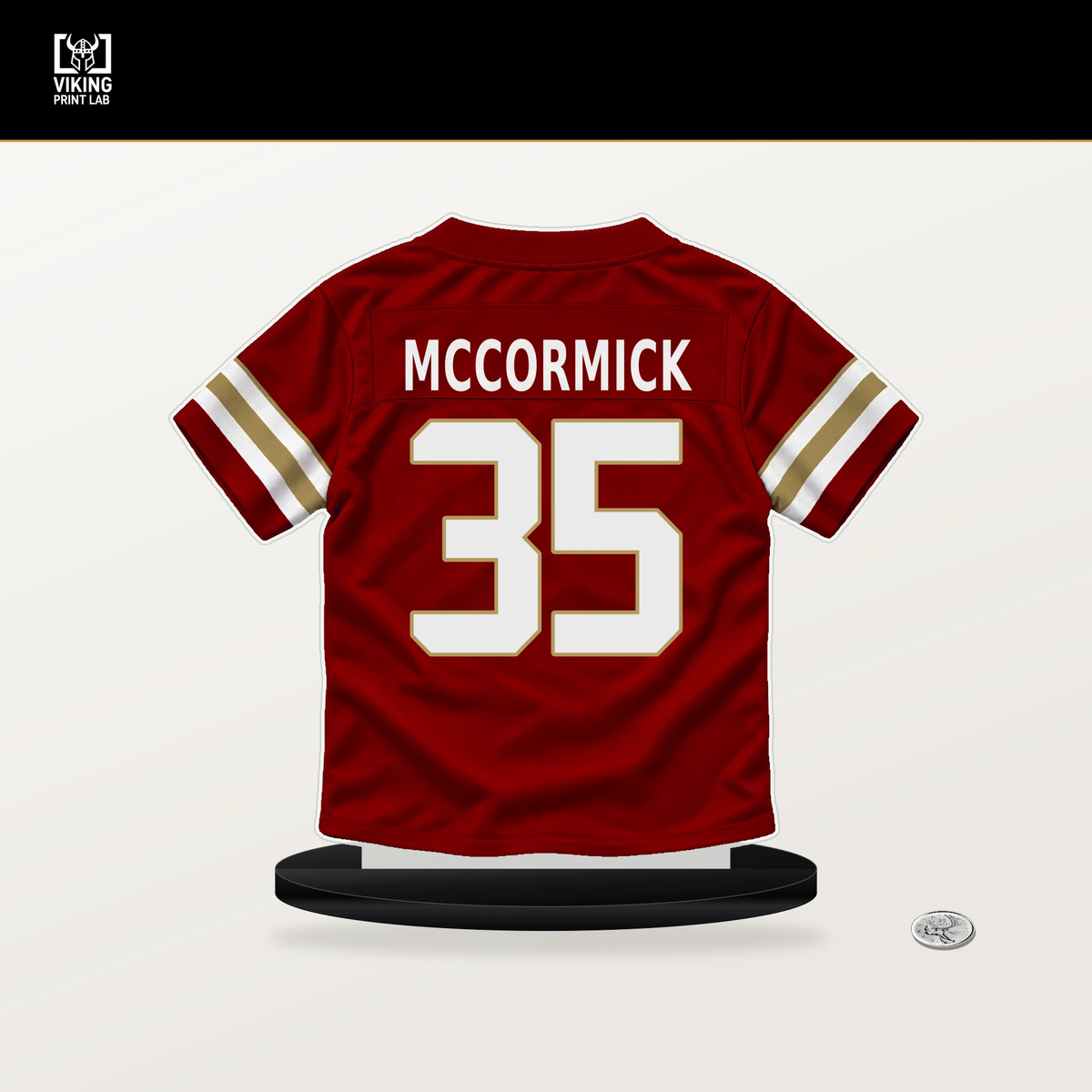 Sincere McCormick number 35 San Francisco 49ers jersey stand with included black base.