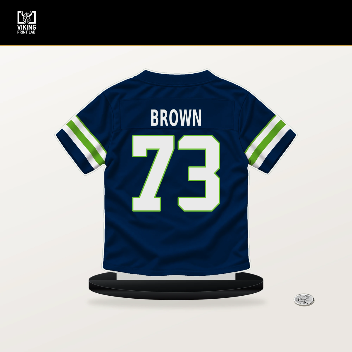 Logan Brown number 73 Seattle Seahawks jersey stand with included black base.