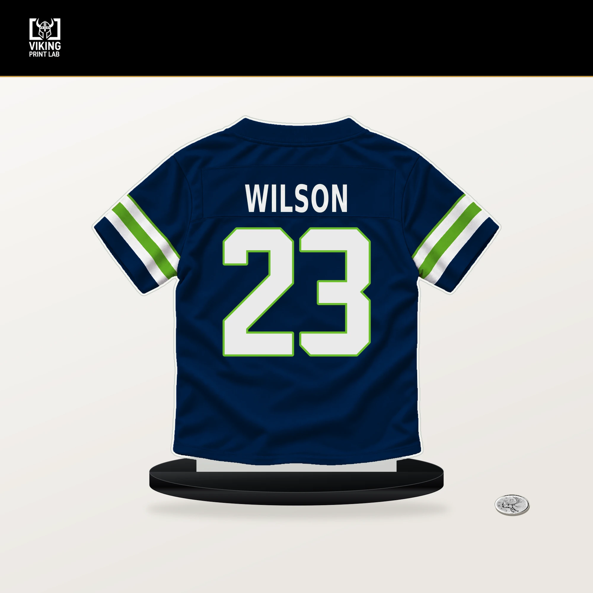 Emanuel Wilson number 23 Seattle Seahawks jersey stand with included black base.