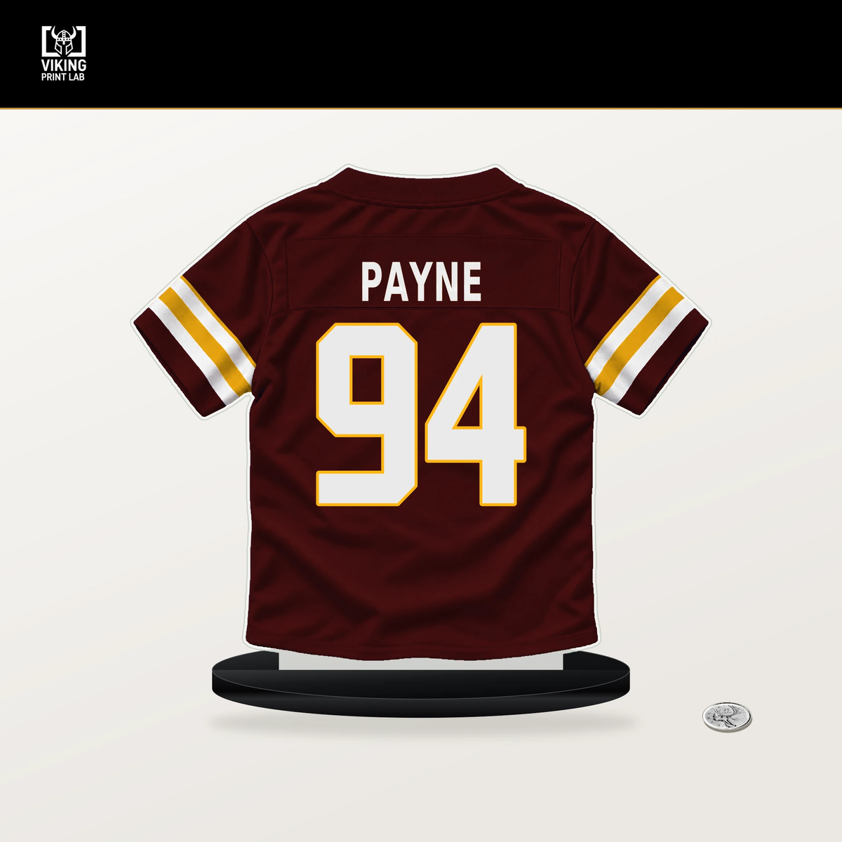 Daron Payne number 94 Washington Commanders jersey stand with included black base.