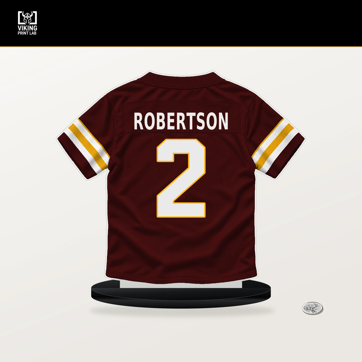 Amik Robertson number 2 Washington Commanders jersey stand with included black base.