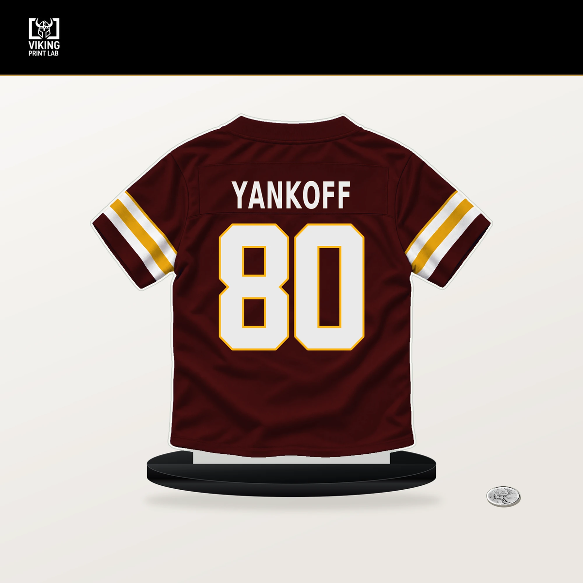 Colson Yankoff number 80 Washington Commanders jersey stand with included black base.