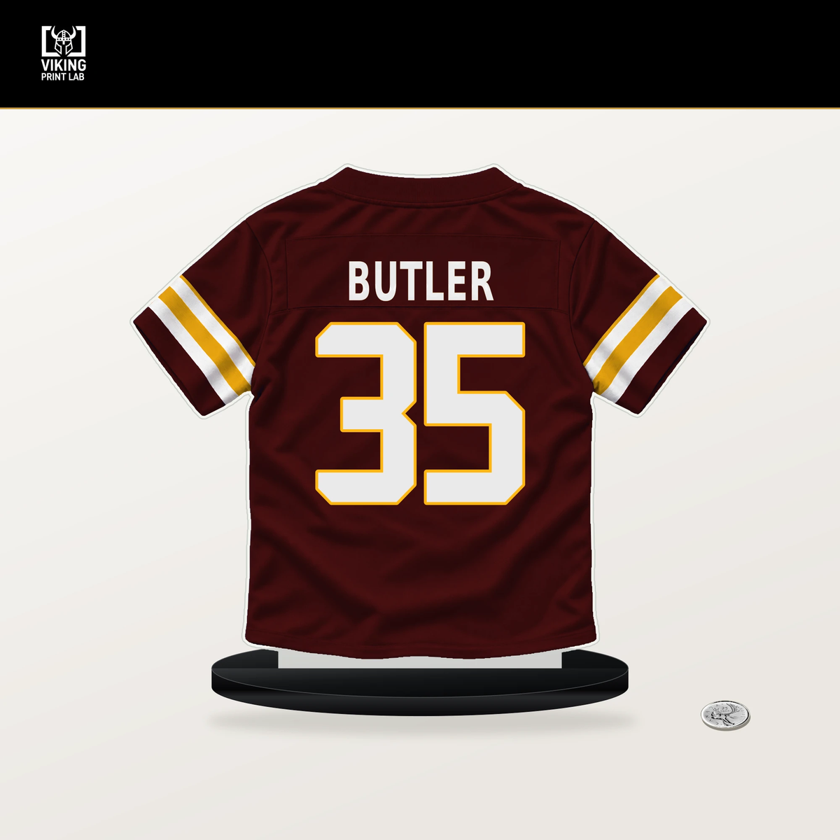 Percy Butler number 35 Washington Commanders jersey stand with included black base.