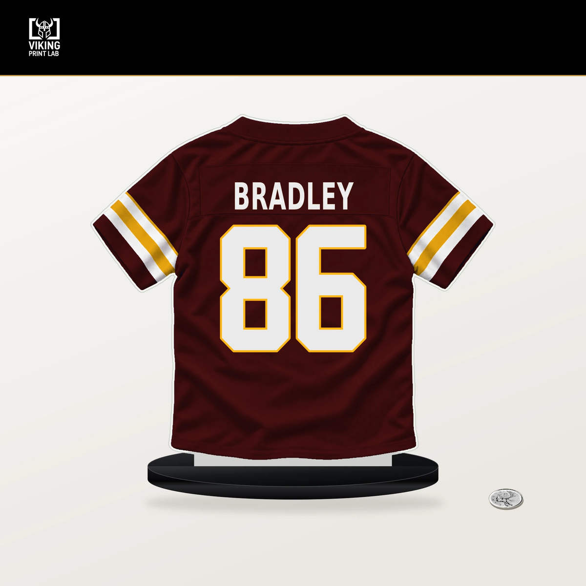 Jaden Bradley number 86 Washington Commanders jersey stand with included black base.