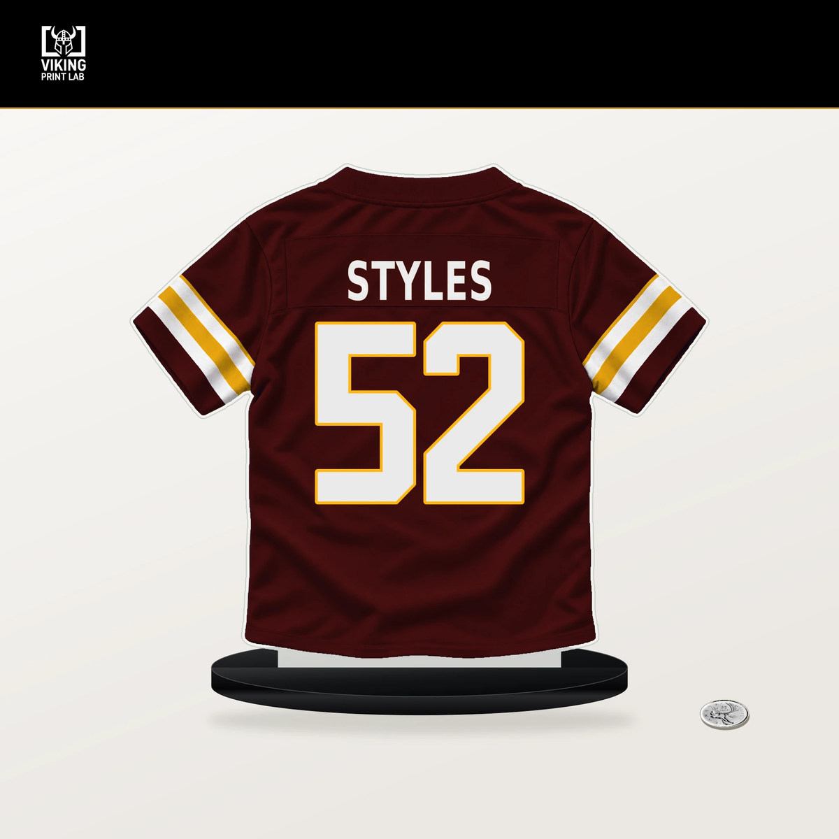 Sonny Styles number 52 Washington Commanders jersey stand with included black base.