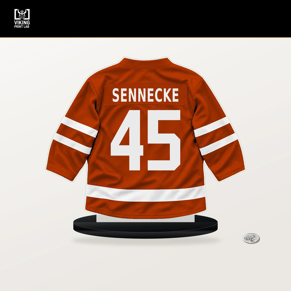 Beckett Sennecke number 45 Anaheim Ducks jersey stand with included black base.