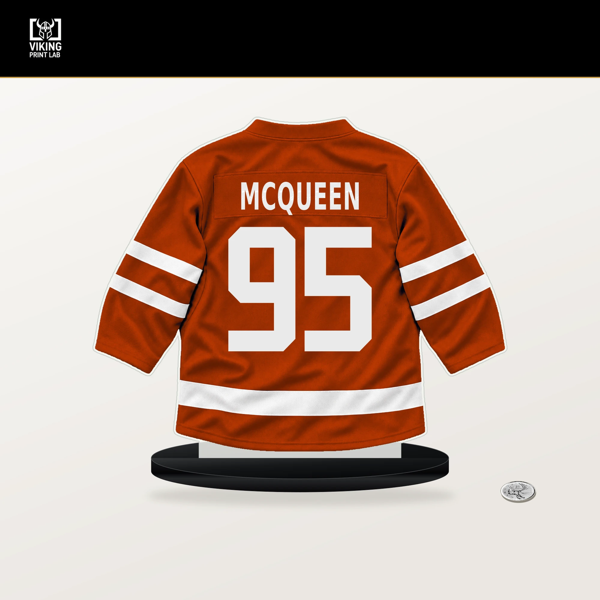 Roger McQueen number 95 Anaheim Ducks jersey stand with included black base.