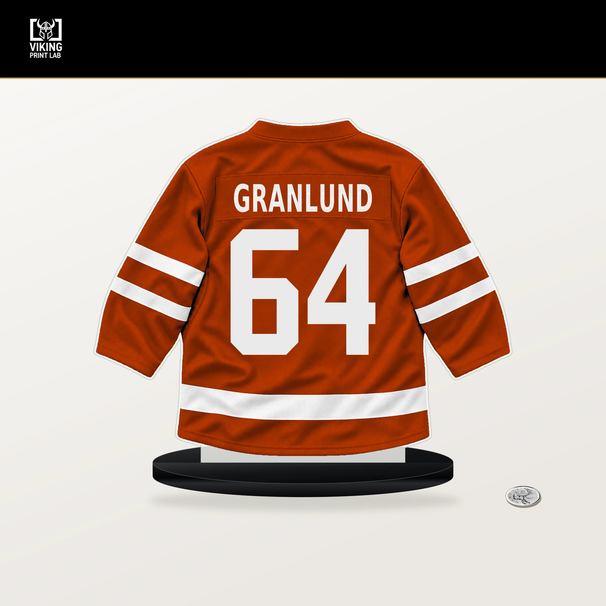 Mikael Granlund number 64 Anaheim Ducks jersey stand with included black base.