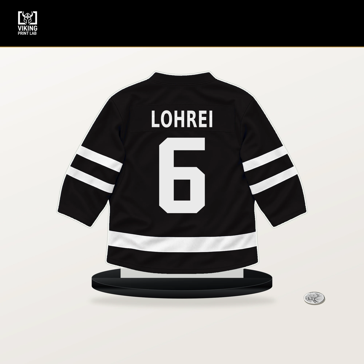 Mason Lohrei number 6 Boston Bruins jersey stand with included black base.