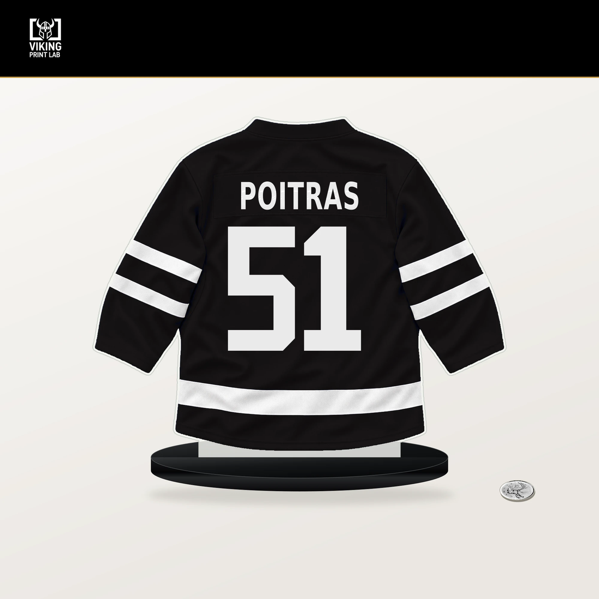 Matthew Poitras number 51 Boston Bruins jersey stand with included black base.