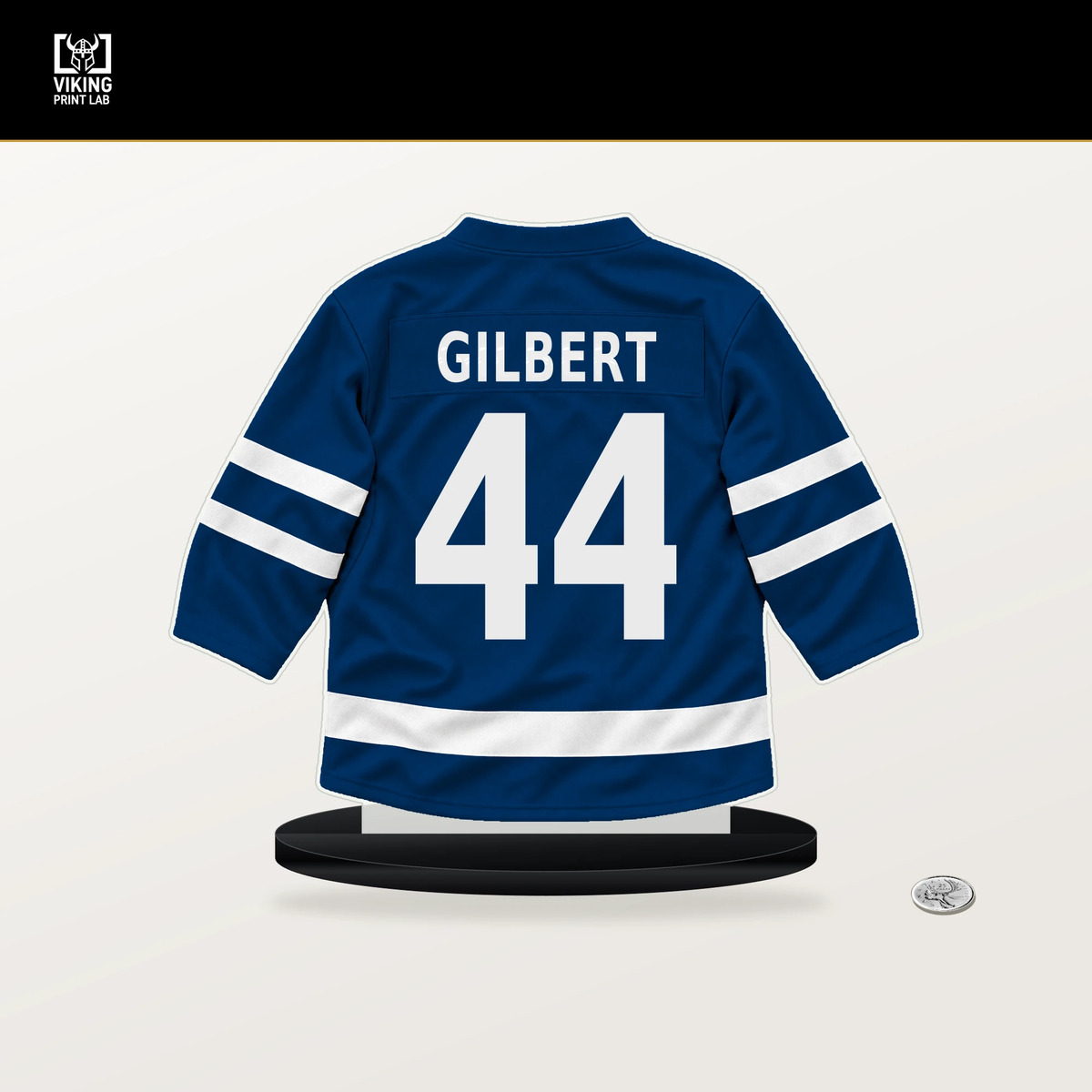 Dennis Gilbert number 44 Buffalo Sabres jersey stand with included black base.
