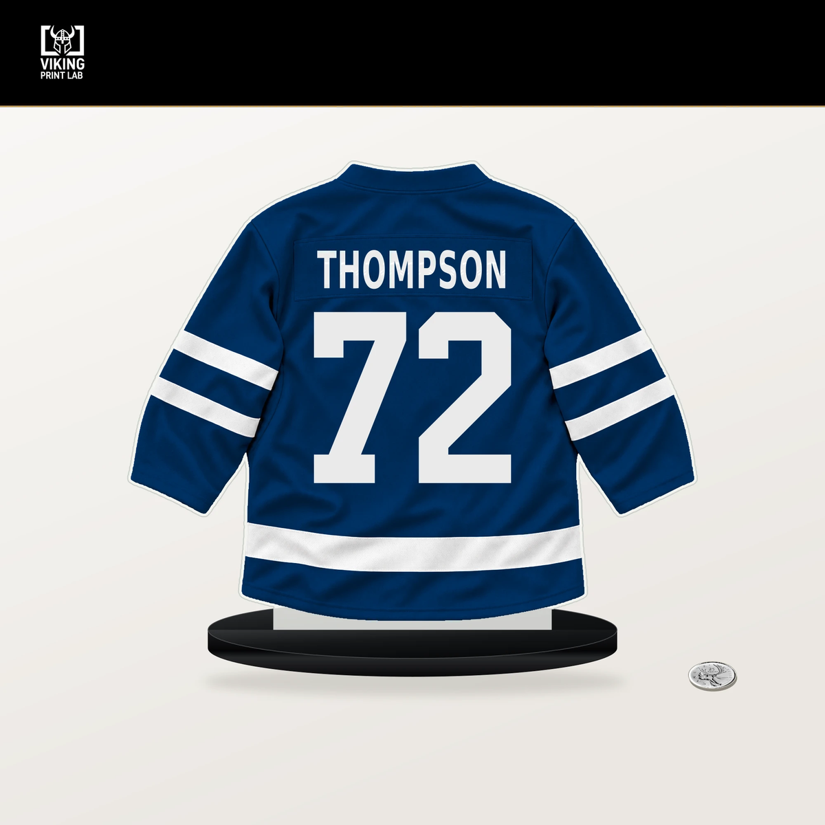 Tage Thompson number 72 Buffalo Sabres jersey stand with included black base.