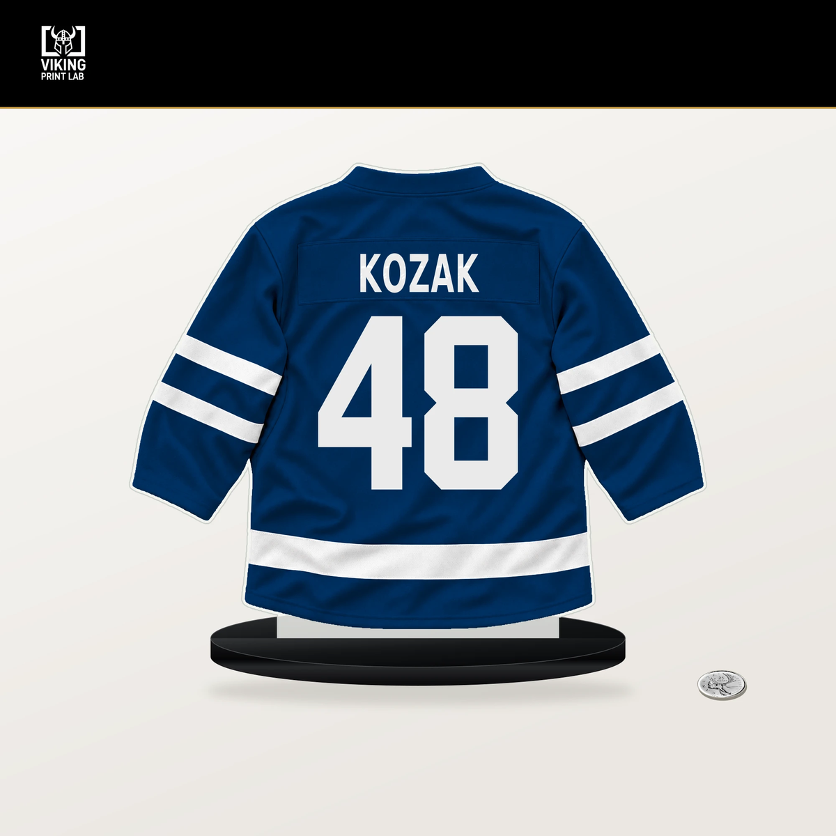 Tyson Kozak number 48 Buffalo Sabres jersey stand with included black base.