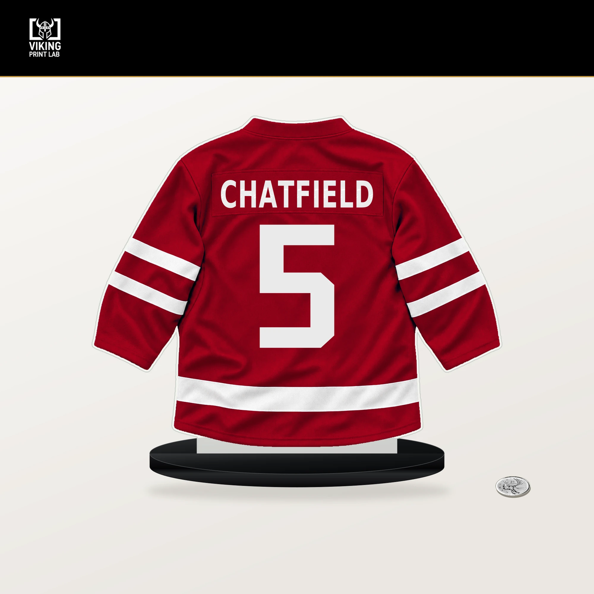Jalen Chatfield number 5 Carolina Hurricanes jersey stand with included black base.