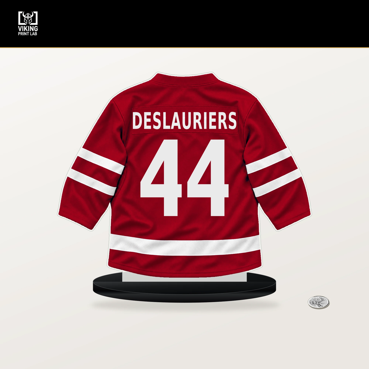 Nicolas Deslauriers number 44 Carolina Hurricanes jersey stand with included black base.