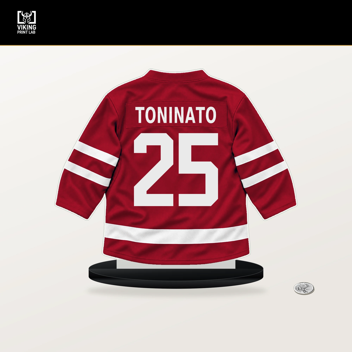 Dominic Toninato number 25 Chicago Blackhawks jersey stand with included black base.