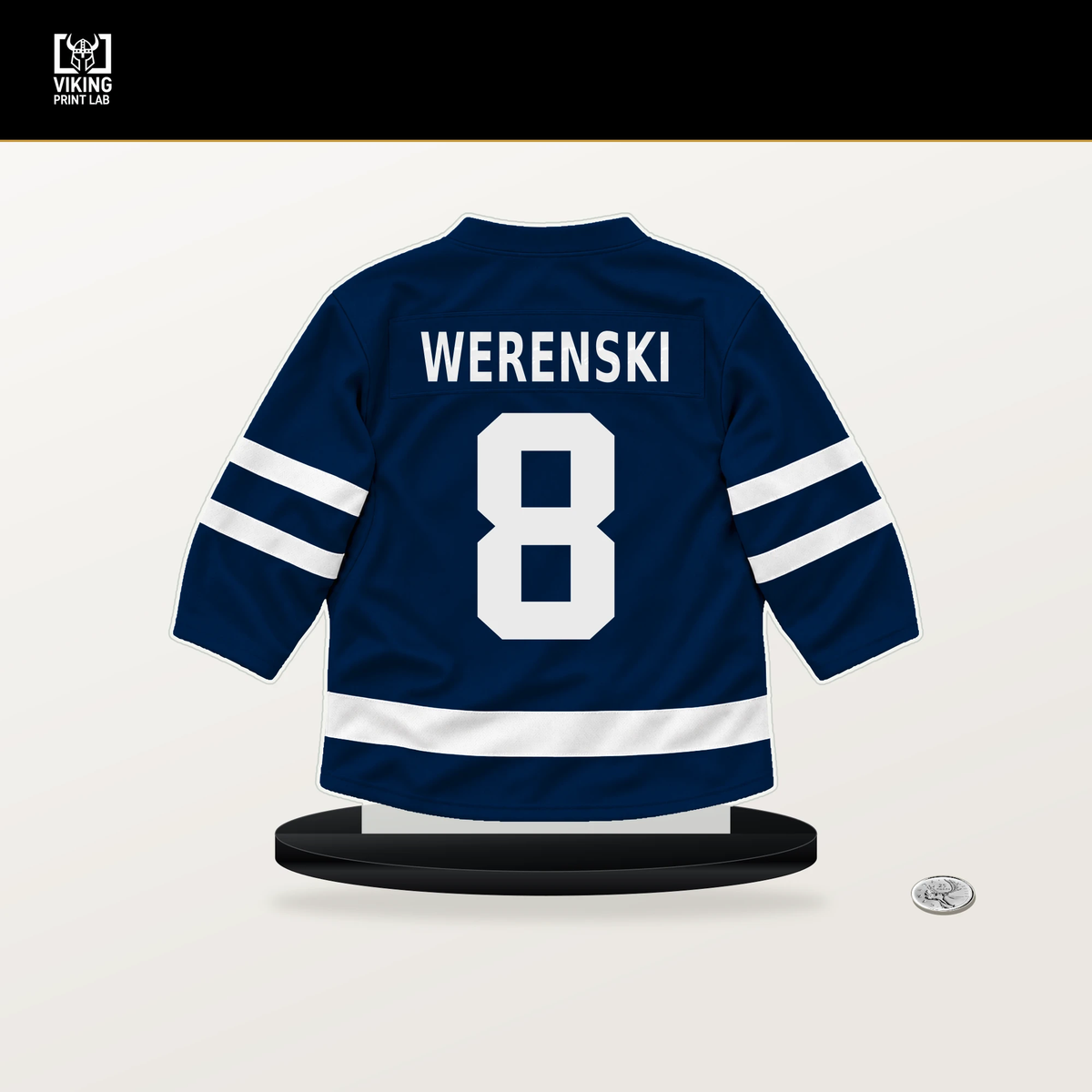 Zach Werenski number 8 Columbus Blue Jackets jersey stand with included black base.