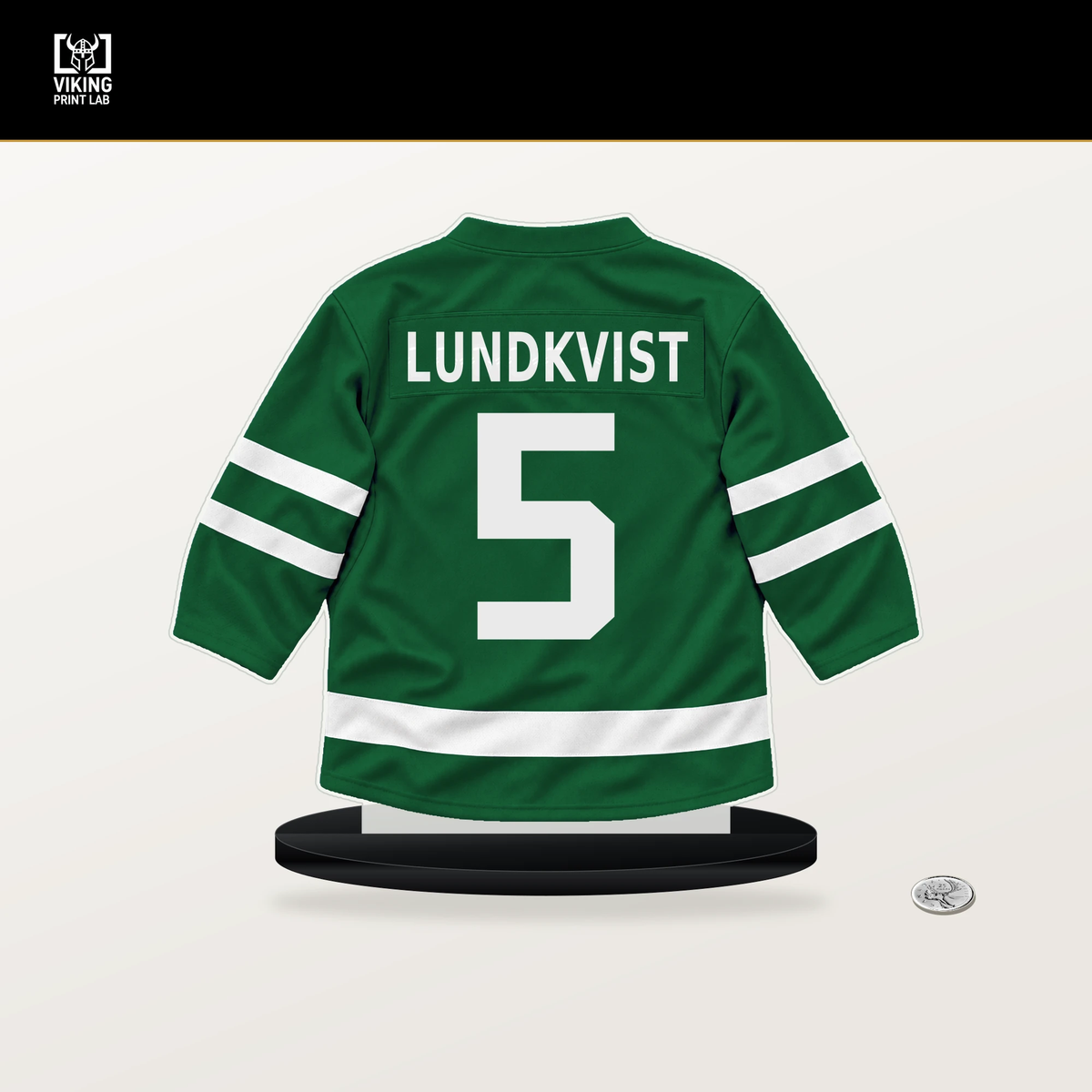 Nils Lundkvist number 5 Dallas Stars jersey stand with included black base.