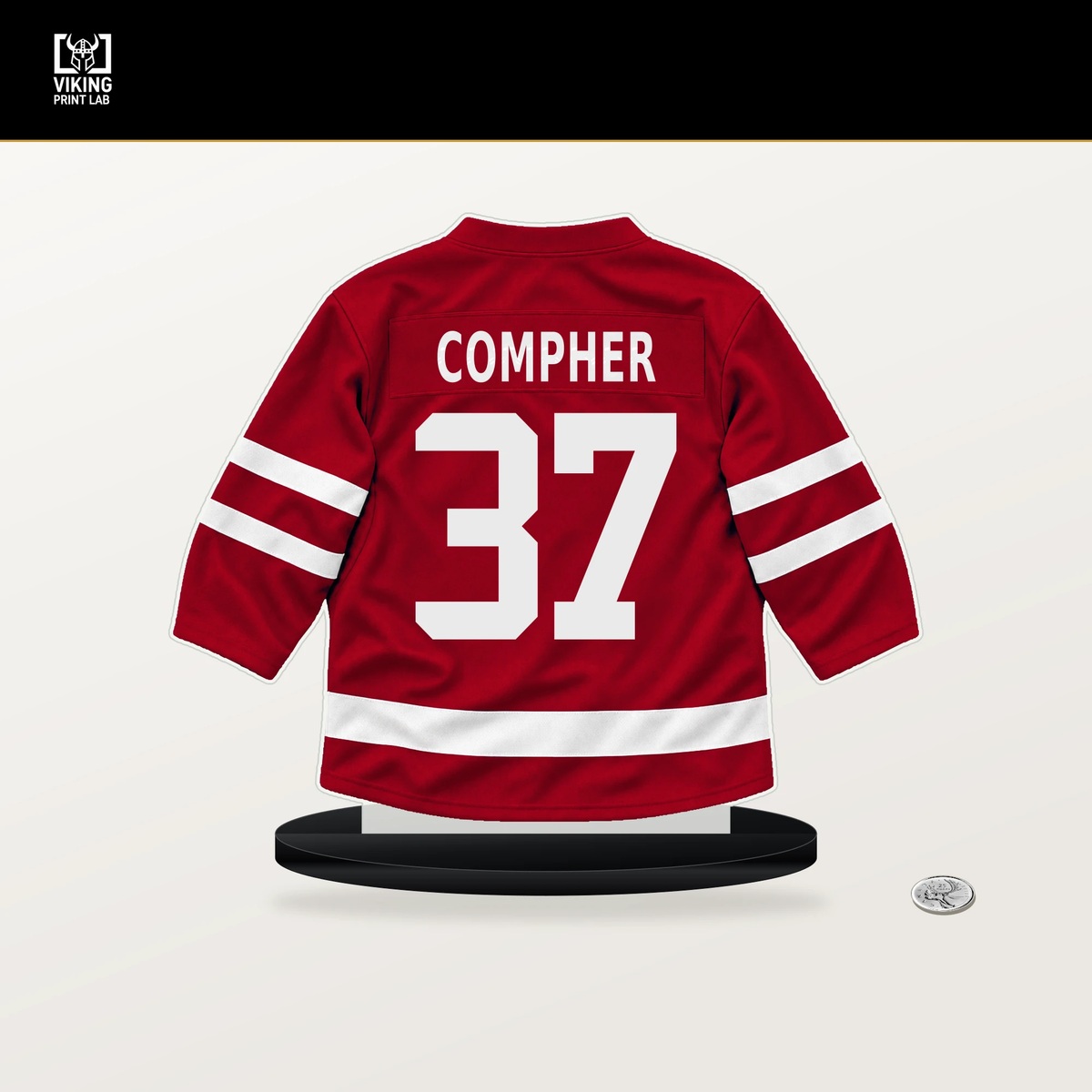 J.T. Compher number 37 Detroit Red Wings jersey stand with included black base.
