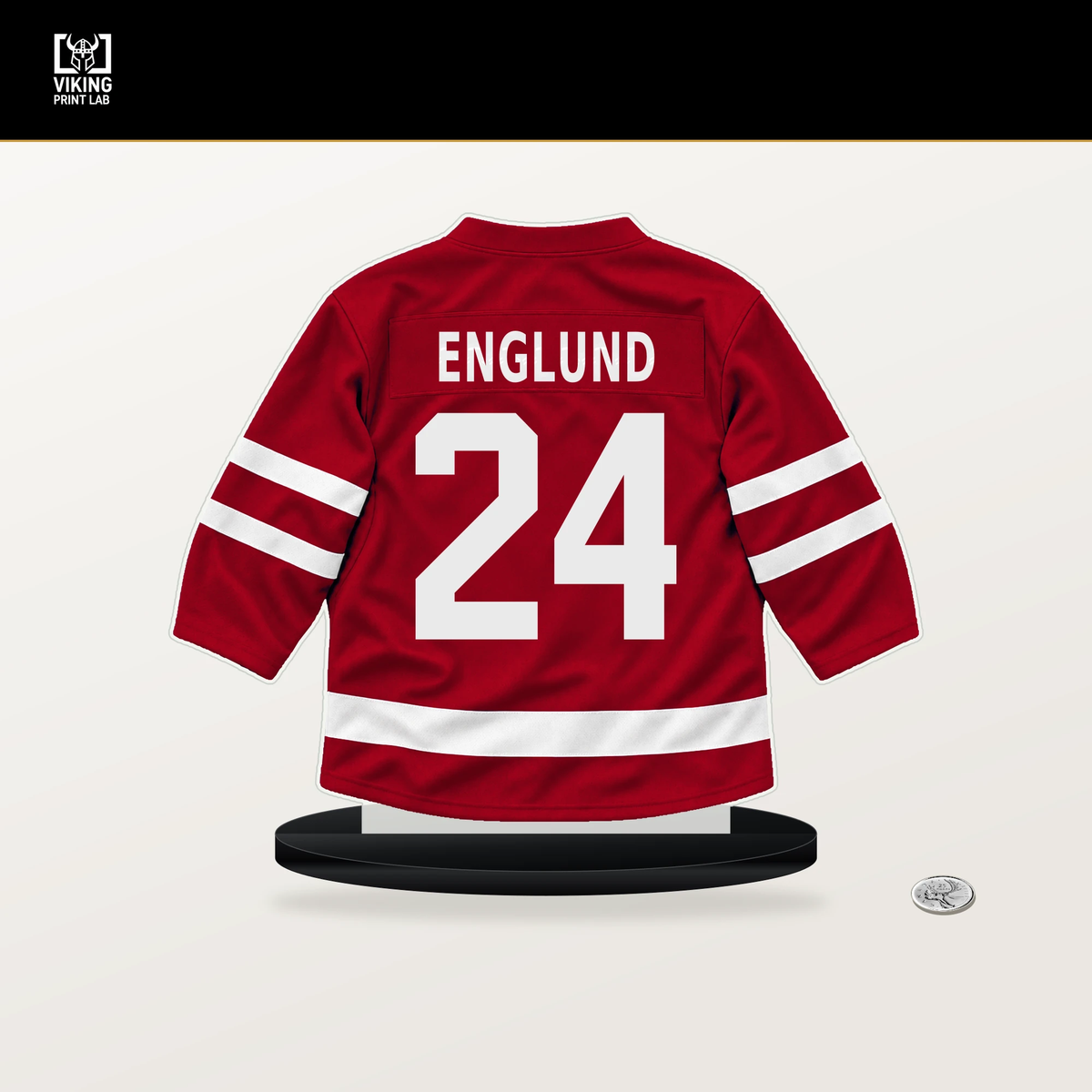 Andreas Englund number 24 Detroit Red Wings jersey stand with included black base.