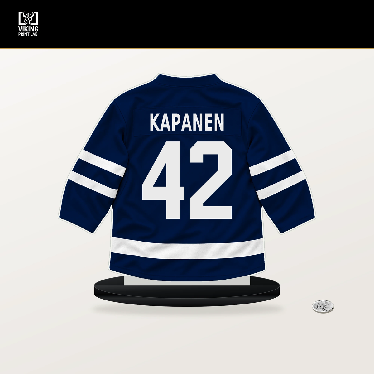 Kasperi Kapanen number 42 Edmonton Oilers jersey stand with included black base.