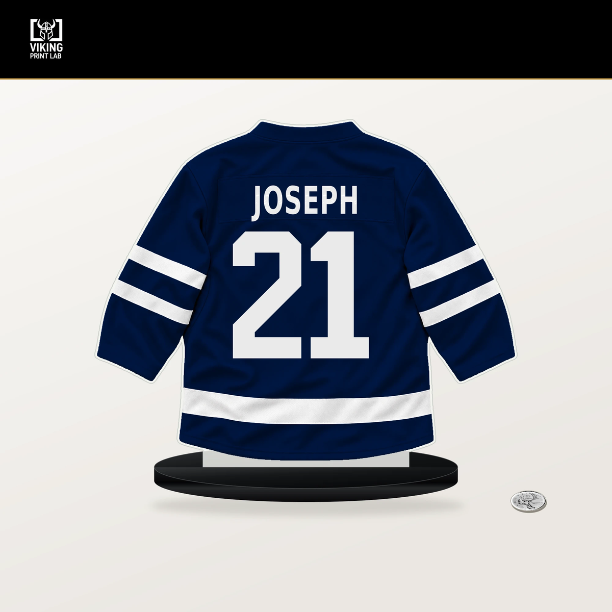 Mathieu Joseph number 21 Edmonton Oilers jersey stand with included black base.