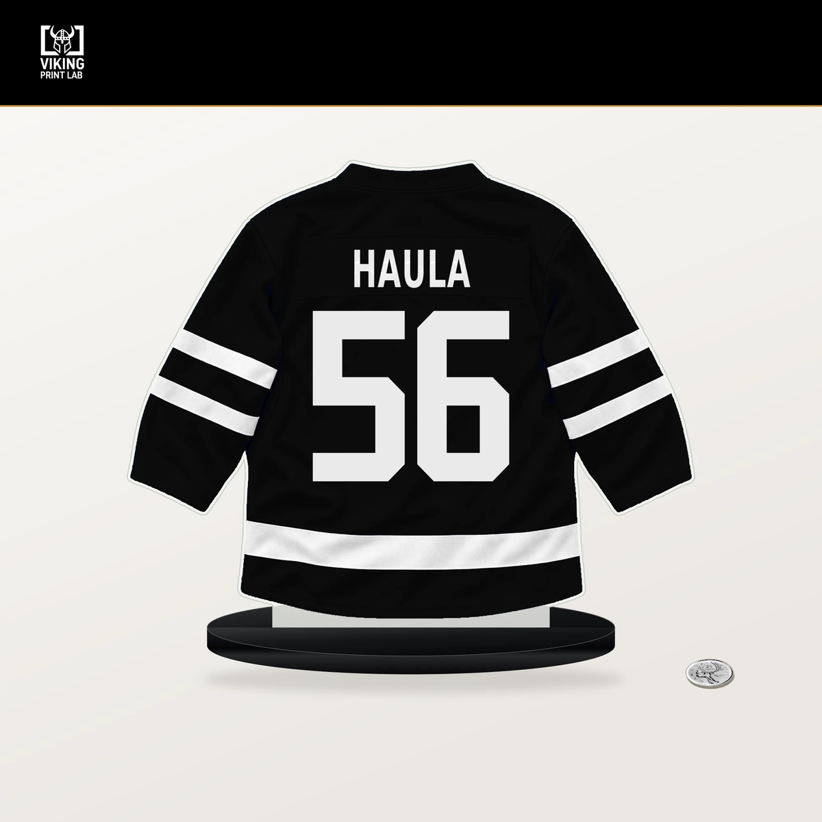 Erik Haula number 56 Los Angeles Kings jersey stand with included black base.