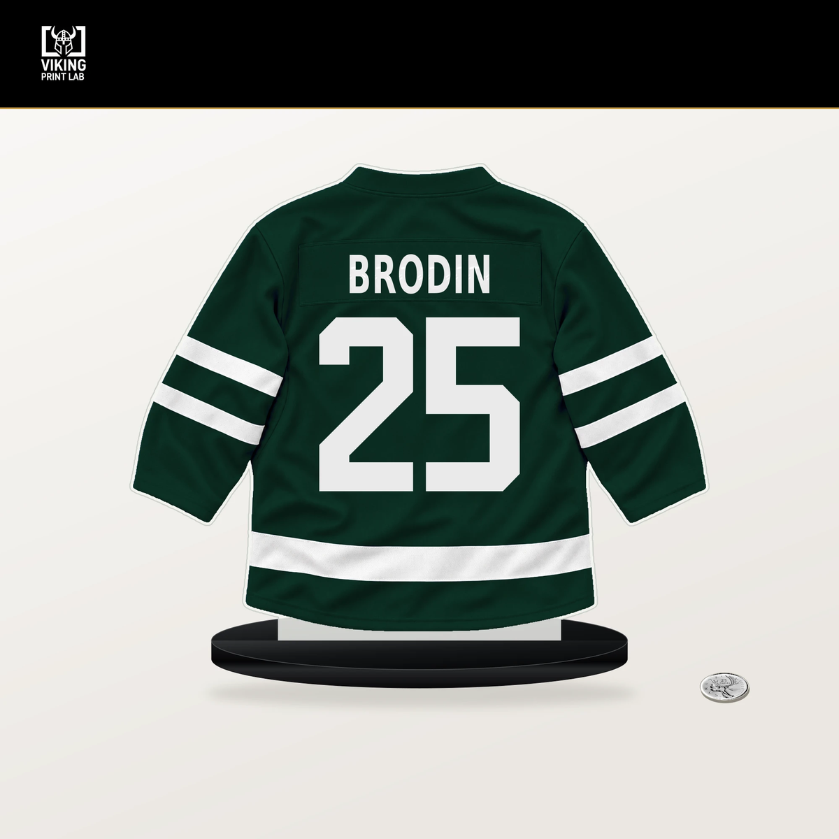 Jonas Brodin number 25 Minnesota Wild jersey stand with included black base.
