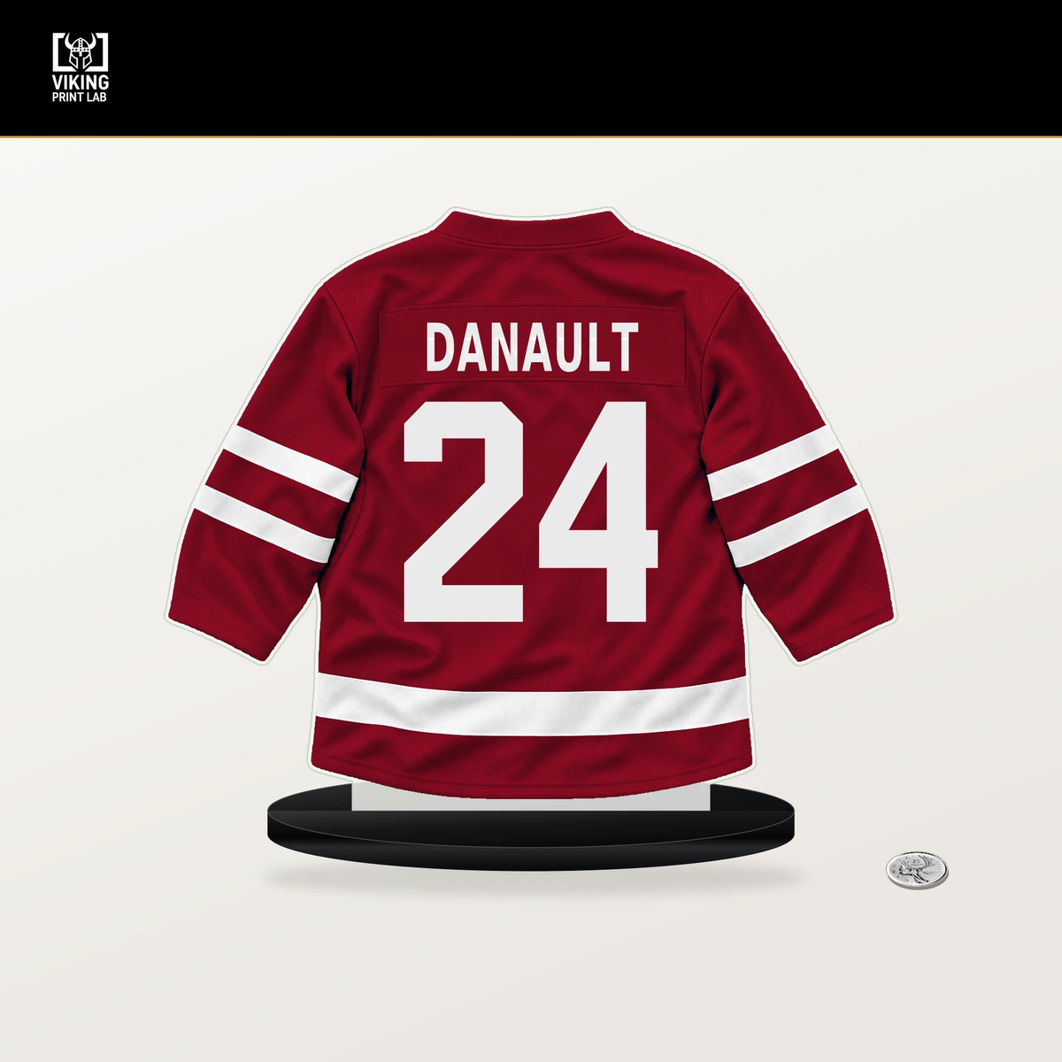Phillip Danault number 24 Montreal Canadiens jersey stand with included black base.