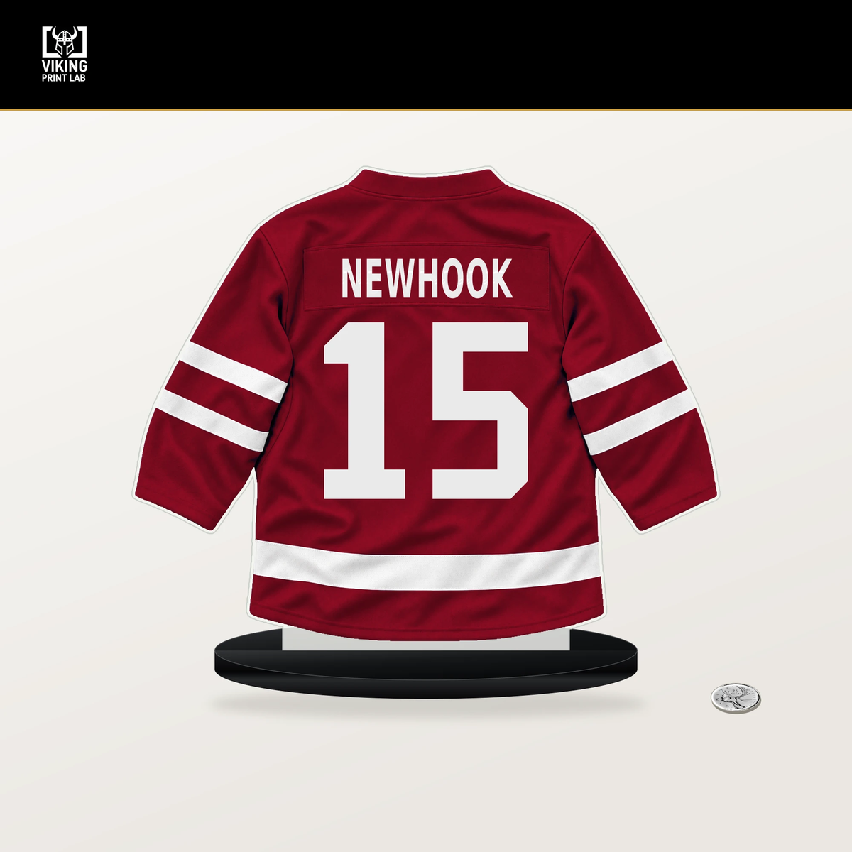 Alex Newhook number 15 Montreal Canadiens jersey stand with included black base.