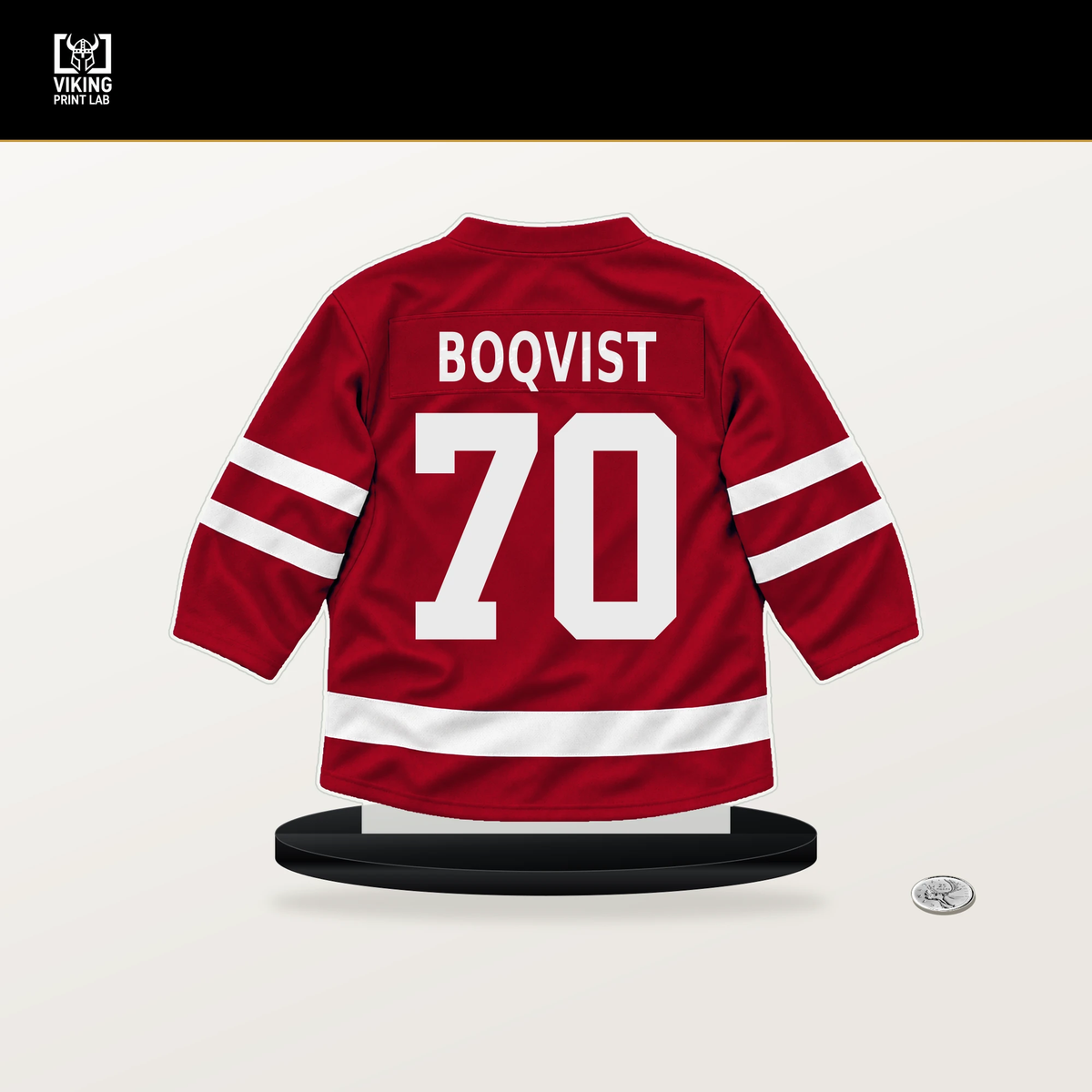 Jesper Boqvist number 70 New Jersey Devils jersey stand with included black base.