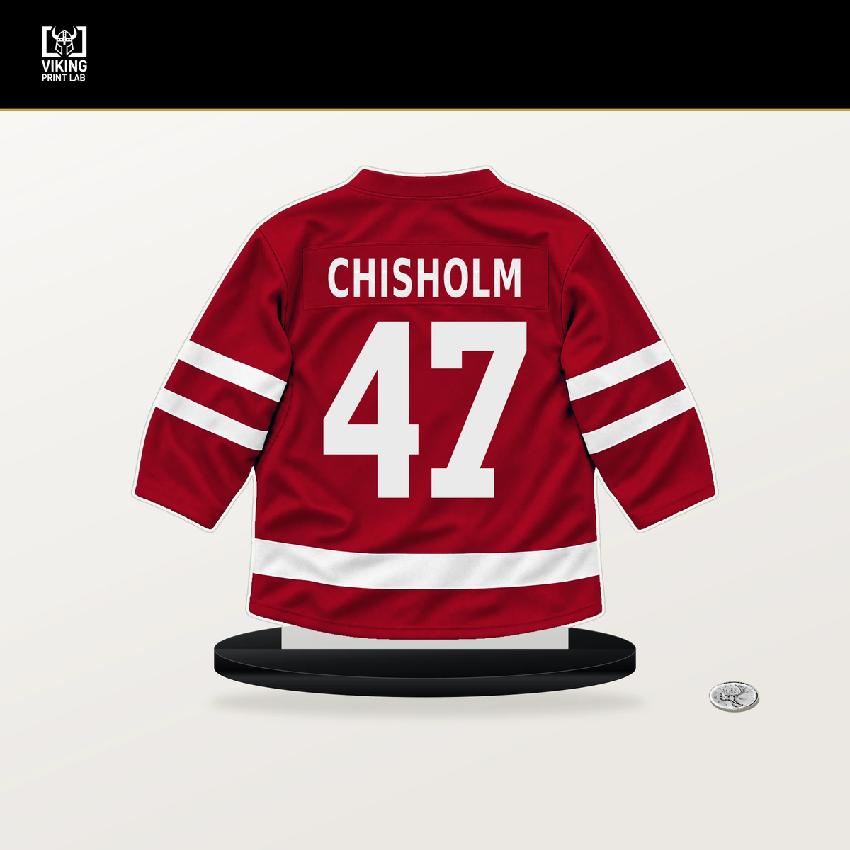 Declan Chisholm number 47 New Jersey Devils jersey stand with included black base.