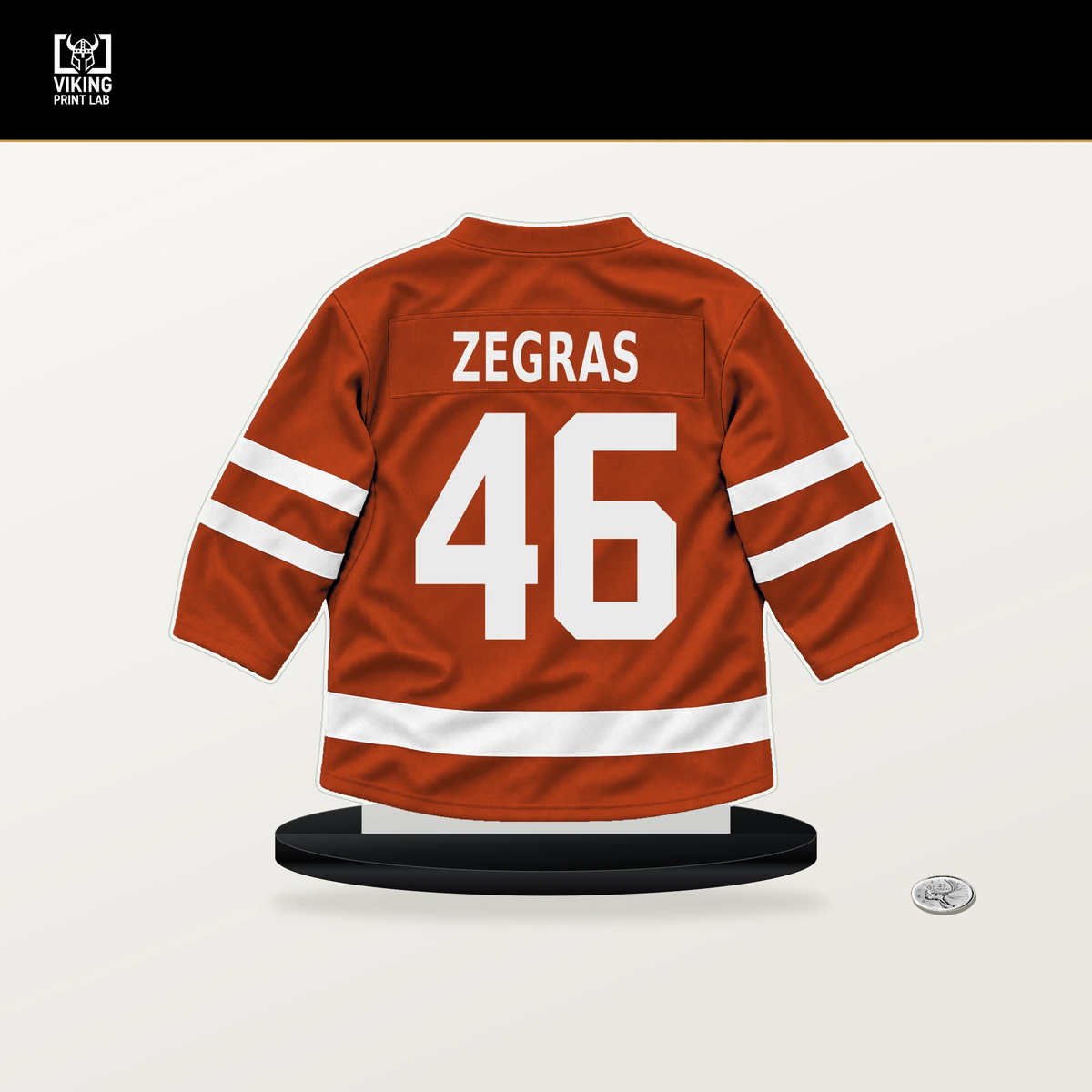 Trevor Zegras number 46 Philadelphia Flyers jersey stand with included black base.