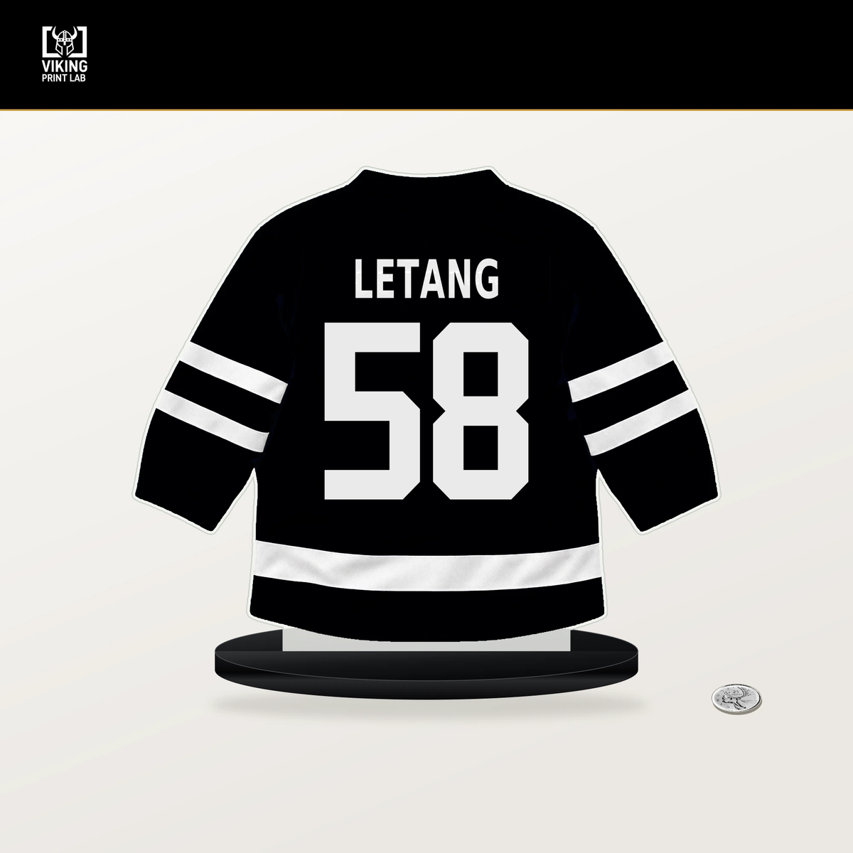 Kris Letang number 58 Pittsburgh Penguins jersey stand with included black base.