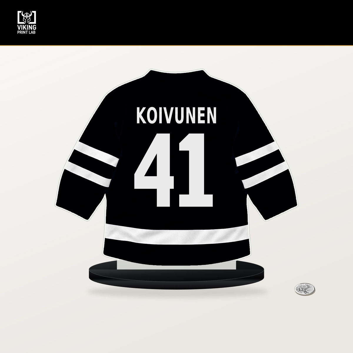 Ville Koivunen number 41 Pittsburgh Penguins jersey stand with included black base.