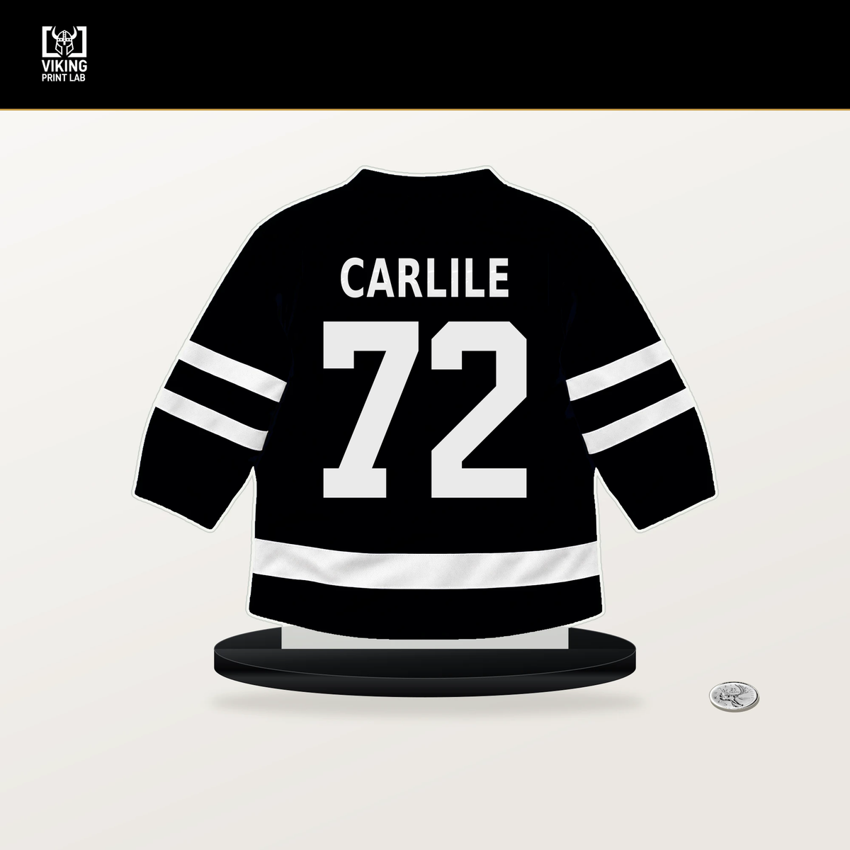 Declan Carlile number 72 Pittsburgh Penguins jersey stand with included black base.
